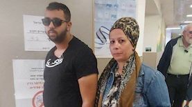 אלמנתו ובנו של הנרצח, צילום: פייסבוק